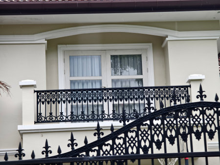 Detailed view of windows, doors and balconies of city buildingsの写真素材