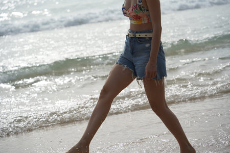 A young woman enjoying a beautiful day at the beach