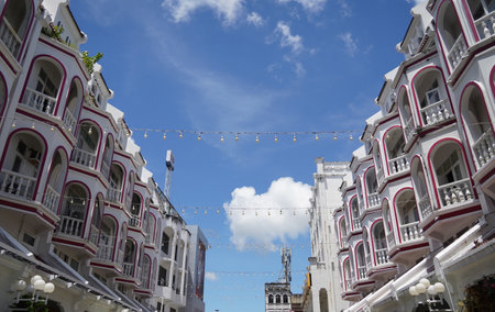 Detailed view of windows, doors and balconies of city buildingsの写真素材