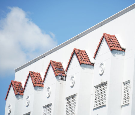 Detailed view of windows, doors and balconies of city buildingsの写真素材