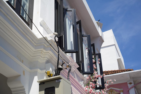 Detailed view of windows, doors and balconies of city buildings