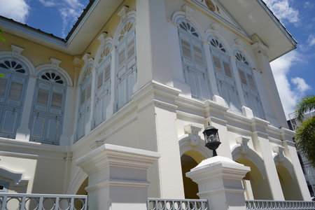 Detailed view of windows, doors and balconies of city buildingsの写真素材