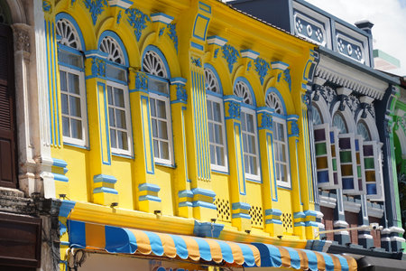 Detailed view of windows, doors and balconies of city buildingsの写真素材