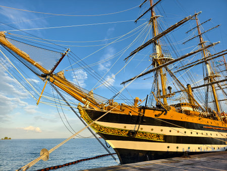 A large old ship at pier under a beautiful blue skyの写真素材