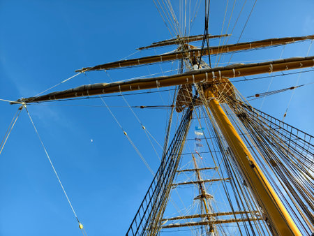 Ropes stretched across the masts of an old shipの写真素材