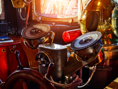 A row of wooden steering wheels located on an old vessel