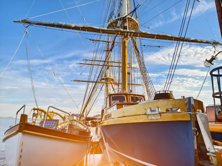 A lifeboat is securely tied to the mast of a sailing vesselの写真素材