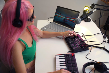 Beautiful young singer and musician broadcast from her home studio