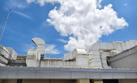 Ventilation pipes on the top of large industrial building