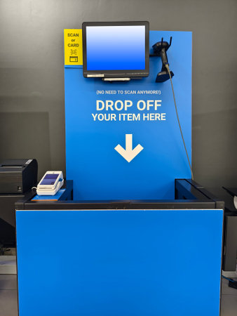 Self-service check out area in large hypermarket