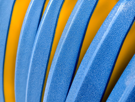 This image features a closeup view of a blue and yellow striped material.の写真素材