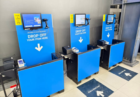 Self-service check out area in large hypermarket