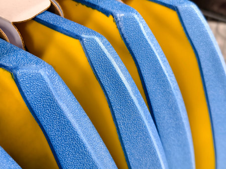 This image features a closeup view of a blue and yellow striped material.