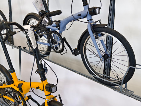 A variety of bicycles are hanging on a rack inside a sport storeの写真素材