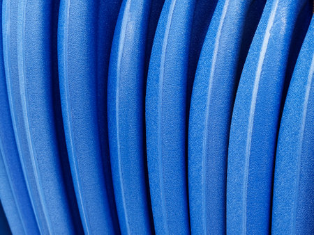 This image features a closeup view of a blue striped plastic.の写真素材