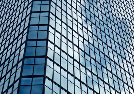 A very tall building featuring numerous windows and spacious balconiesの写真素材