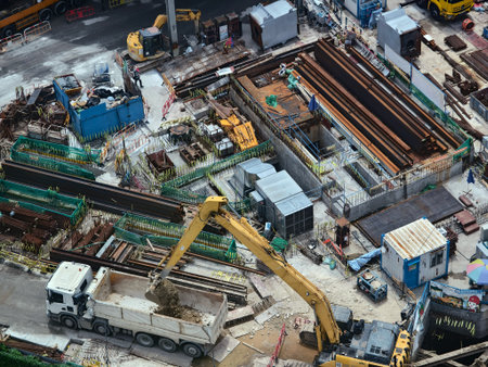 An aerial perspective showcasing a construction site located in a bustling cityの写真素材