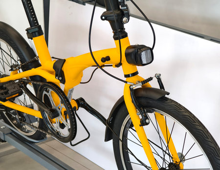A variety of bicycles are hanging on a rack inside a sport storeの写真素材
