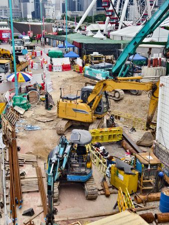 An aerial perspective showcasing a construction site located in a bustling city