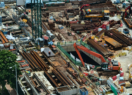 An aerial perspective showcasing a construction site located in a bustling city