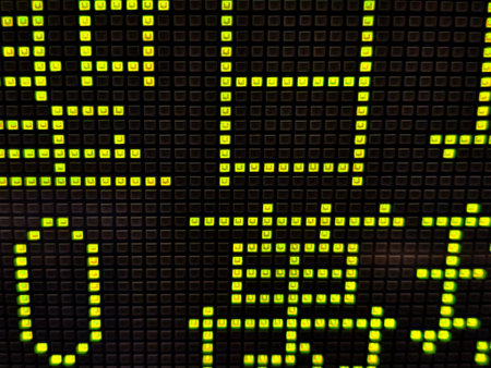 A vibrant rows of bright digital squares is neatly lined up formation on dark background