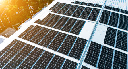 Energy efficient rooftop with multiple solar panels installed on a contemporary mall