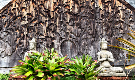 Intricate patterns on the weathered wood highlight artistic craftsmanshipの写真素材