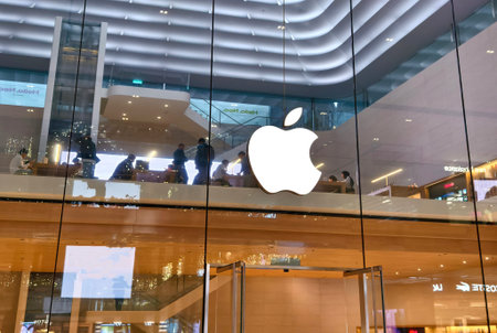 KUALA LUMPUR, MALAYSIA - MARCH 15, 2026: Big and vibrant Apple shop. Lively gadget store showcasing devices on sleek surfaces.