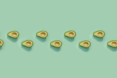 avocado on a colored background food patternの写真素材