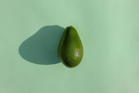 avocado on a colored background food patternの写真素材