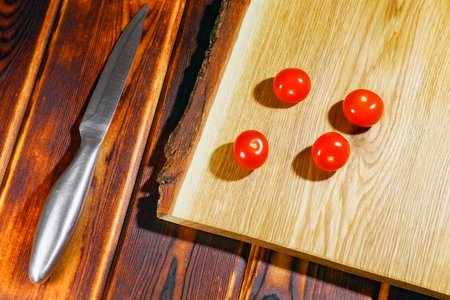 tomato on a chopping Board as background