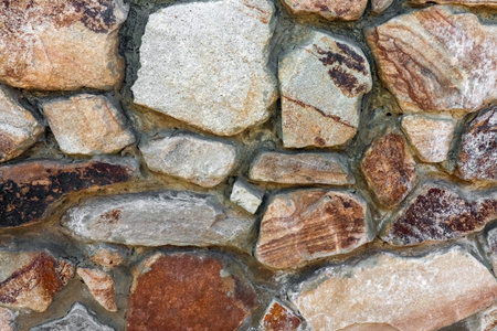 masonry wall paving stones as a background close up