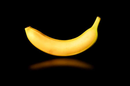 banana on a black background close-up. isolateの写真素材
