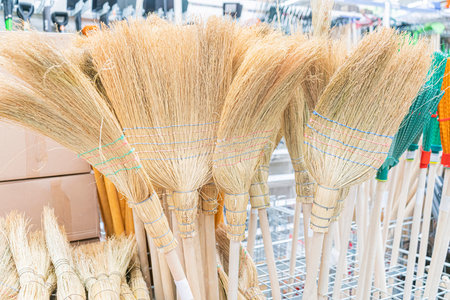 brooms in the store close-up. as background