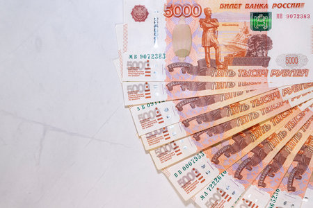 Russian ruble bills laid out on the marble in close-up