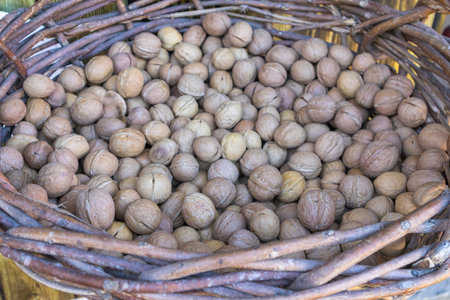 walnuts in a large wicker basket close-up