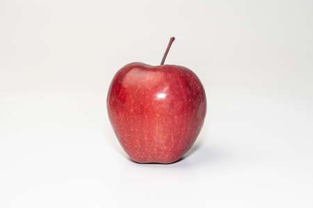 red apple on a white background side viewの写真素材