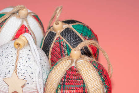 Christmas balls on a pink background close-upの写真素材