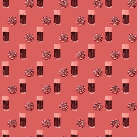 seamless pattern of pomegranate and juice on a red background