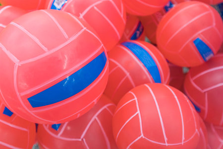 volleyball balls in a basket in the market