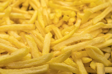 fried french fries straws macro as background