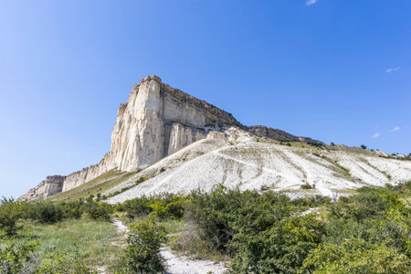 white chalk limestone rock against a blue sky aerial viewの写真素材