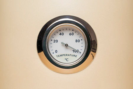 the mechanical thermometer shows 100 degrees Celsius close-upの写真素材