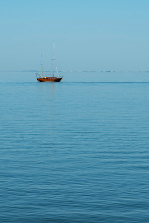 yachts on the water against the blue skyの写真素材