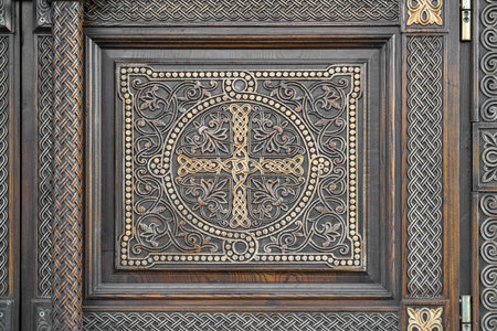 Ornament carved on wood. Gold and black backgroundの写真素材