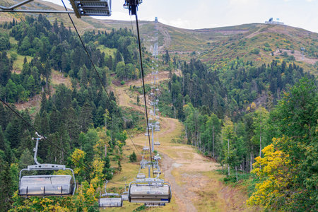 lifts of the mountain cable car on the background of mountains