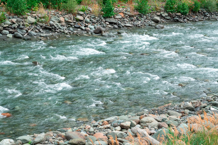 the rapid flow of the mountain river Mzymtaの写真素材