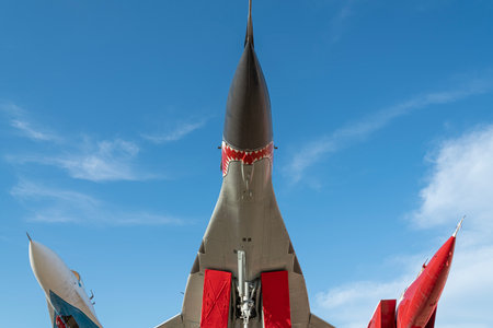 Fighter Jet on Display Against a Clear Blue Sky in an Outdoor Exhibitionの写真素材