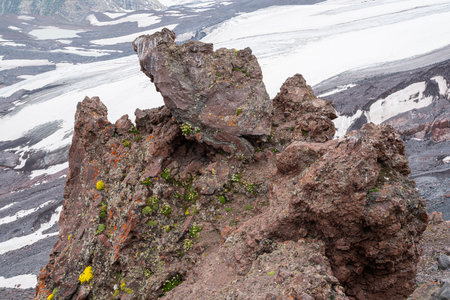 Rocky Formation With Vibrant Moss at a Mountain Glacier Site in Summerの写真素材