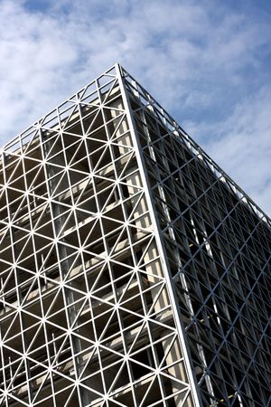 Abstract metallic building and blue skyの写真素材